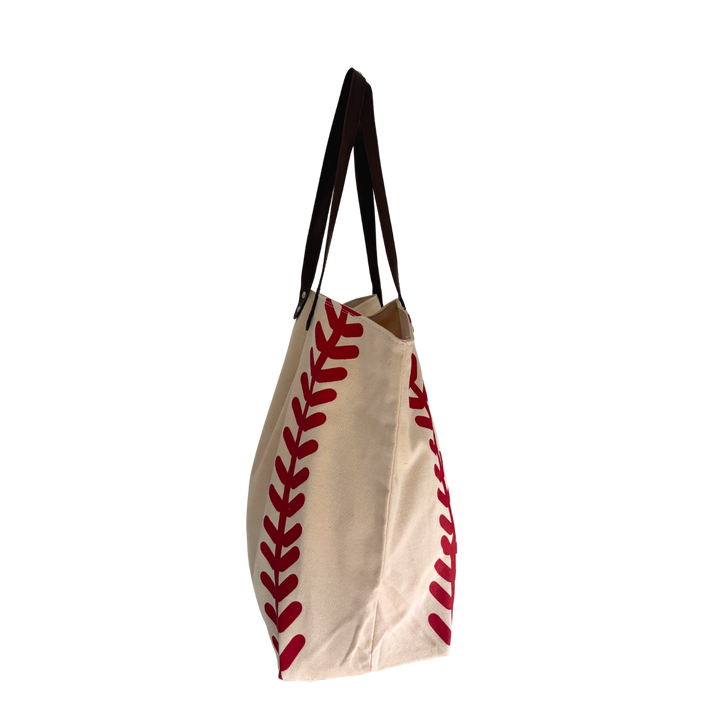 Baseball-stitch canvas tote – side profile. Vertical Athletics brand.