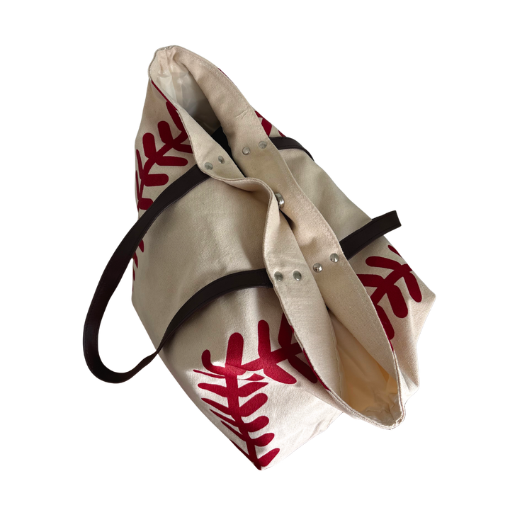 Sporty canvas tote with faux leather straps. Vertical Athletics brand.
