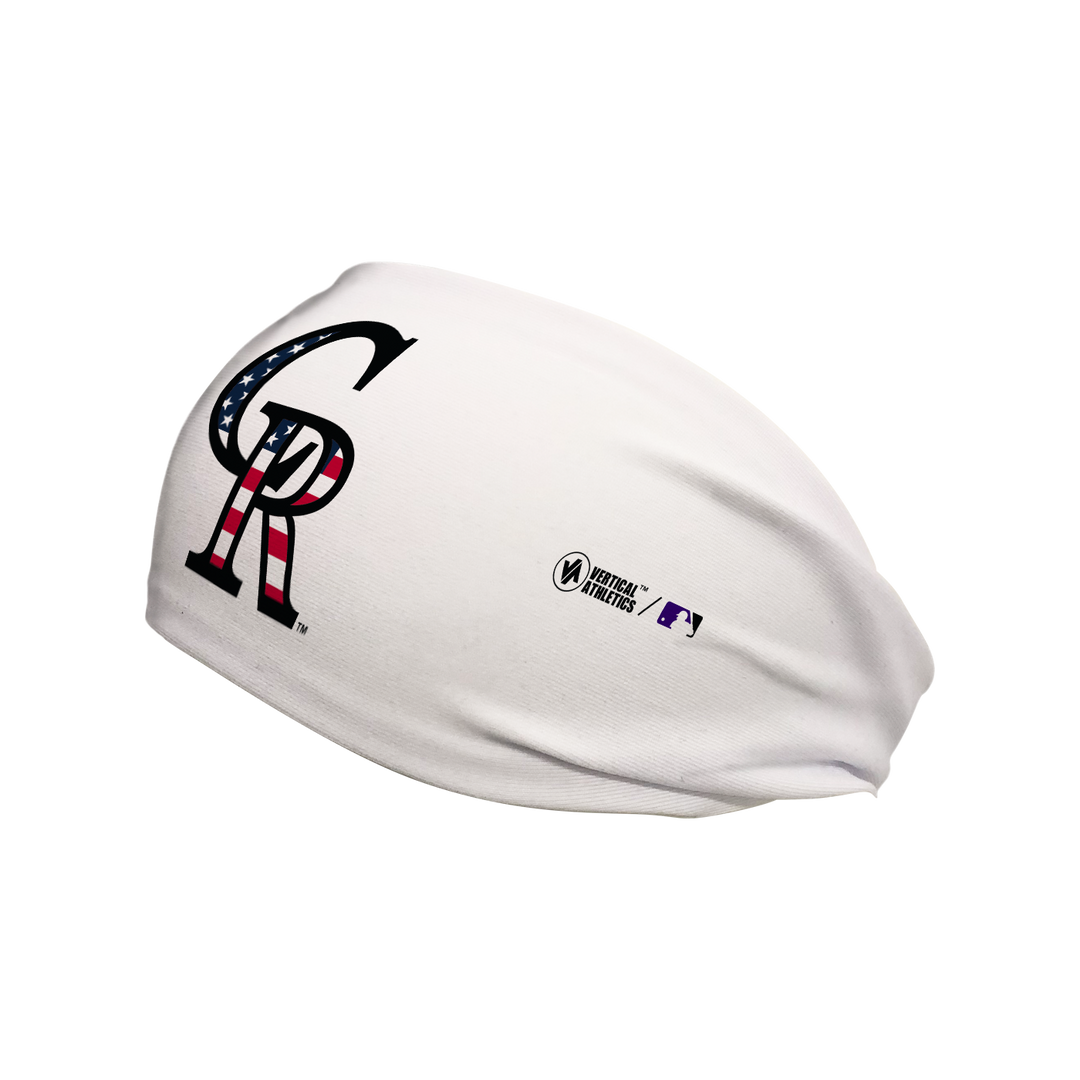 Side view of MLB Colorado Rockies white headband with flag filled cap logo. Made in USA, Vertical Athletics brand.