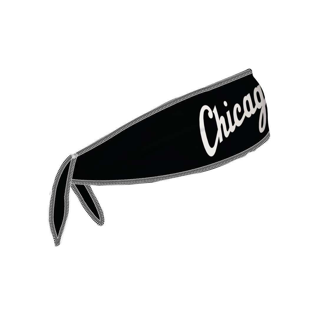Side view of MLB Chicago White Sox black tieback headband with wordmark  logo. Made in USA, Vertical Athletics brand.